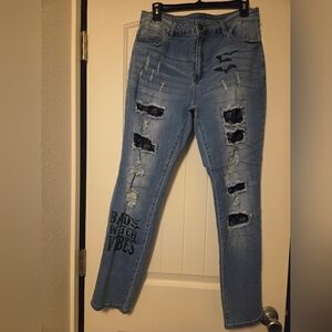 Distressed Blue Skinny Jeans with Black Accents